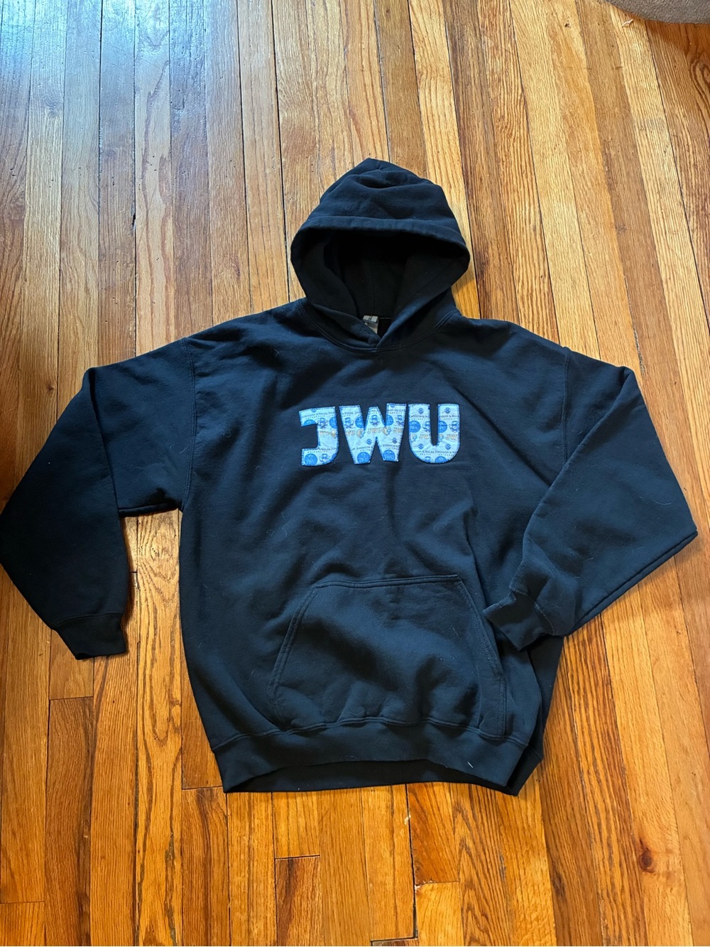 Johnson and Wales Black Hoodie with custom stitched JWU Logo